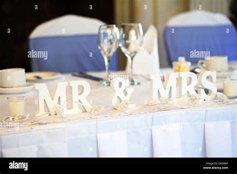Mr & Mrs decoration on wedding reception table Stock Photo - Alamy