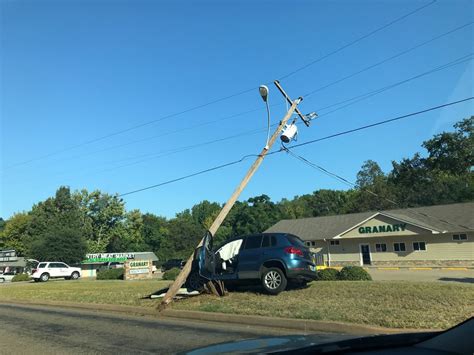 Car Crashes Into Utility Pole Causes Traffic Backup On Front Street In