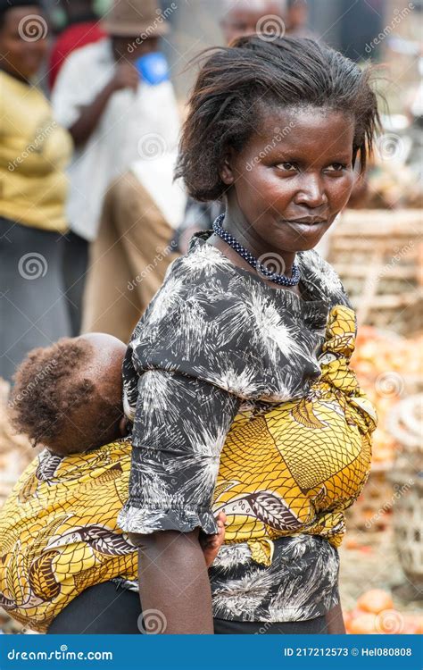 Beautiful African Women With Baby In Sling On Street Market In Uganda