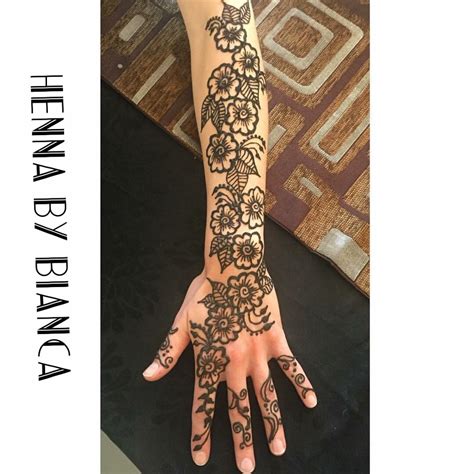 This henna tattoo, rendered in the center of the wearer's upper back, utilizes black and. Half sleeve henna tattoo. Instagram: @henna_by_bianca ...