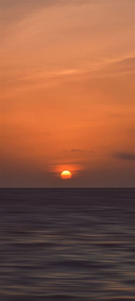 Sunset Horizon Sea Wallpaper 720x1600