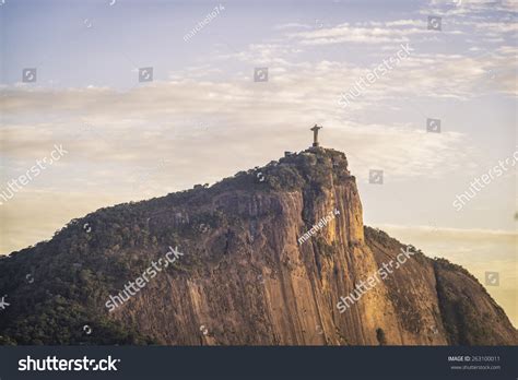 Sunrise Over Christ The Redeemer In Rio De Janeiro Brazil Stock Photo