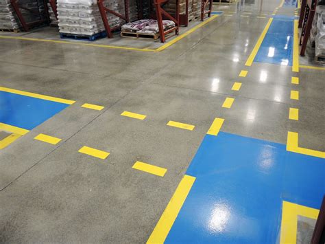 Concrete Floor Polishing And New Blue And Yellow Safety