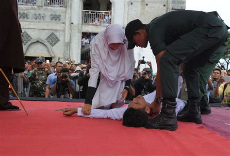 man caned until he collapses as sharia law cops whip him for sex before marriage world news