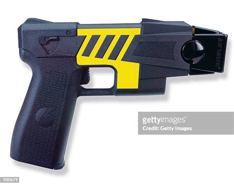 Undated Photograph An Air Taser Photos And Premium High Res Pictures