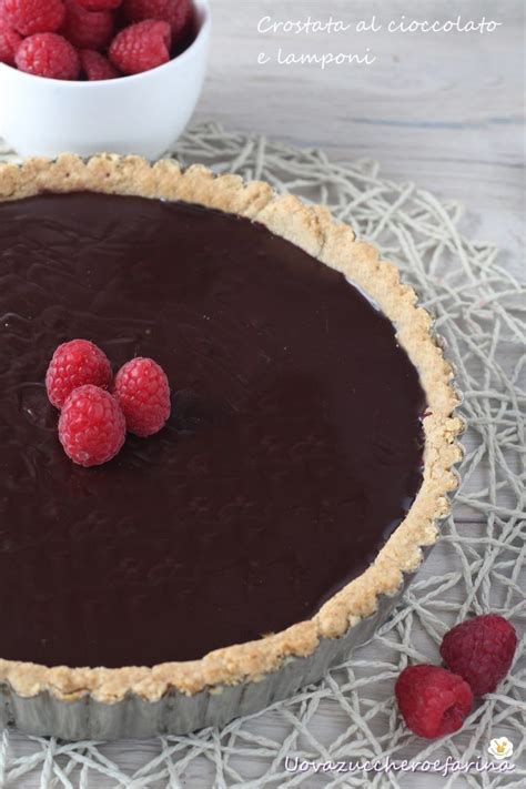 Nella planetaria con gancio a foglia lavorare il burro per qualche minuto e aggiungere il cioccolato. Crostata al cioccolato e lamponi | Ricetta | Lamponi ...