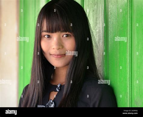 Pretty Burmese Girl With Beautiful Eyes Poses For The Camera Stock