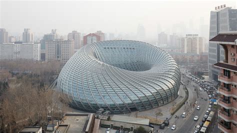 The Beijing Tv Studio Is Wrapped Up In A Doughnut Shaped Lattice