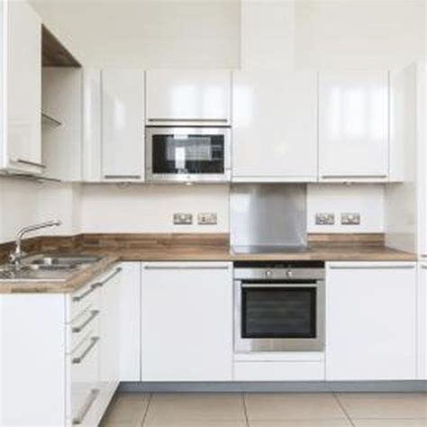 Fortunately, it is possible to paint cabinets of this type, though it is necessary to prep the wood to ensure an aesthetically pleasing appearance when you are done. How to Repair Kitchen Cabinet Doors With Particleboard ...