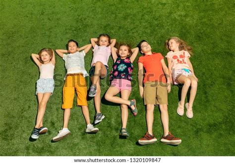 Group Happy Children Playing Outdoors Kids Stock Photo 1320109847