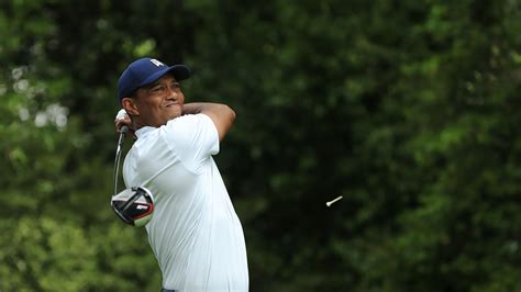 Masters Champion Tiger Woods Plays A Stroke From The No 2 Tee During