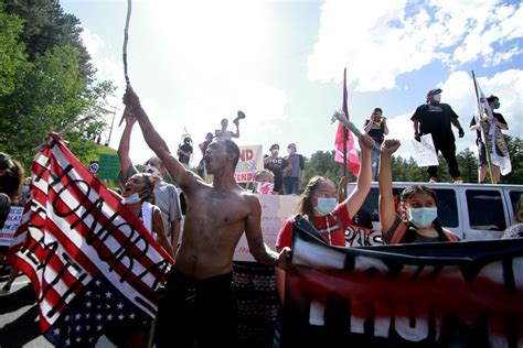 Photos Protesters Block Road Leading To Mount Rushmore Ahead Of