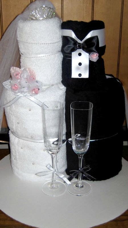 Here we description 2 method to make a kitchen towel cake which can gift to any bithday peron or bride. Bride & Groom Towel Cake Idea ~ Fun gift for a bridal ...