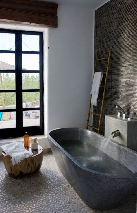 25 Rustic Stone Bathtub With Natural Accents Homemydesign