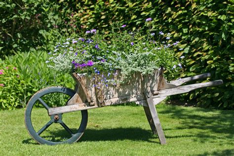 27 Wheelbarrow Flower Planter Ideas For Your Yard Home