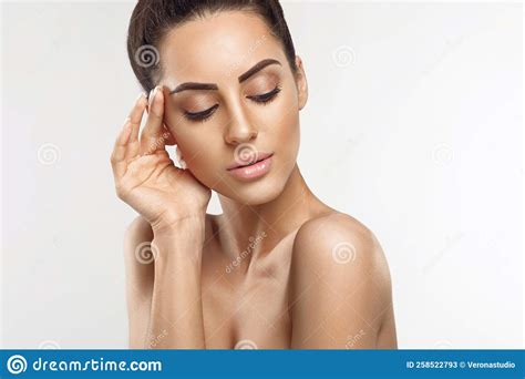 Beautiful Young Woman With Clean Fresh Skin Touch Own Face Facial