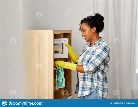 African American Woman Dusting And Cleaning Home Stock Image Image Of