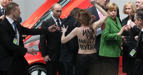 Putin Faces Down Topless Protest In Germany
