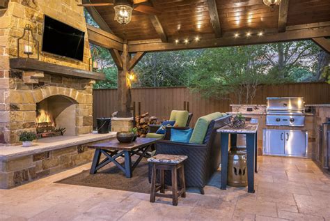 Rustic Outdoor Living Space With Outdoor Kitchen By Texas Custom Patios