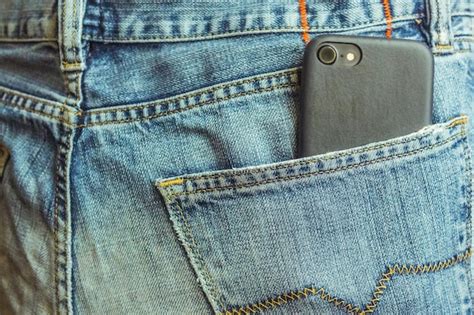 Premium Photo Smartphone In Back Pocket Of Denim Jeans Close Up