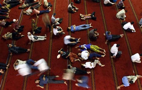 Muslim Men Wait To Break Their Fast On August 10 2012 At Istiqlal Mosque In Jakarta Ap Photo