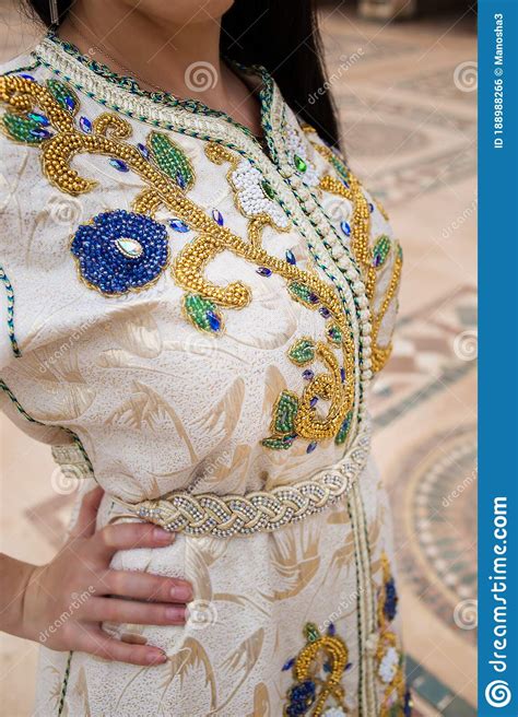 The traditional dress has taken the arab fashion world by storm worn by most the kaftan came about in the ottoman empire and became popular in morocco in the 14th to the. Moroccan Traditional Dress, Embroidery On The Caftan Stock ...