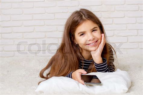 Girl Play Cellphone Stock Image Colourbox