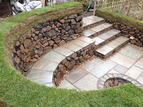 To build a backyard fire pit with bricks, start by digging a circular hole that's 4 feet in diameter and 12 inches deep. Pin on Backyard