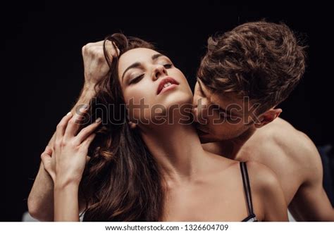 Man Passionately Kissing Beautiful Woman On Stock Photo Edit Now