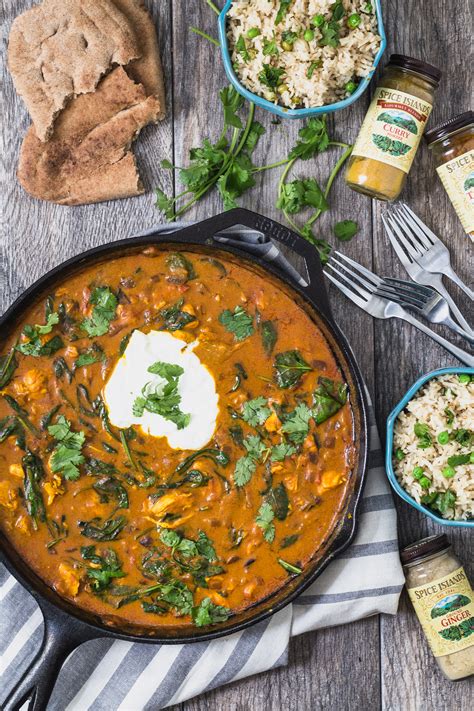 A really easy lamb curry recipe made with lamb shoulder and slow cooked to make it deliciously tender. Chicken curry and spinach with coconut lime rice
