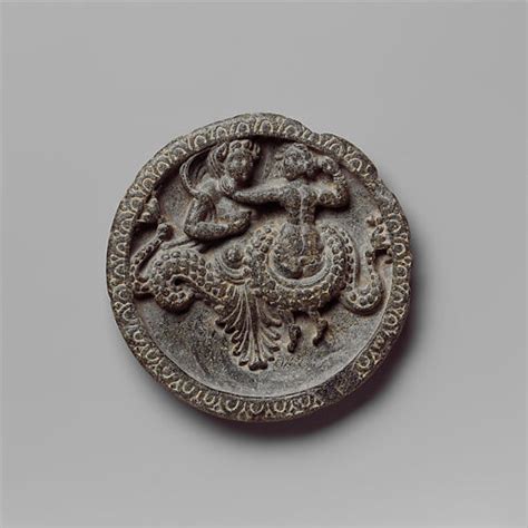 Dish With Winged Eros Riding A Lion Headed Sea Monster Pakistan Ancient Region Of Gandhara