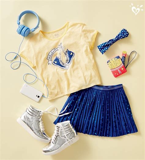 Pair A Graphic Tee With A Sparkly Skirt For A Laid Back Glam Girl Look
