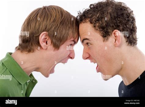 Two Young Men Screaming Each Other Stock Photo Alamy