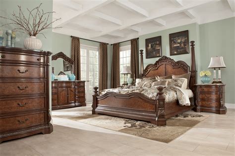 E king panel bed, dresser, mirror, 1 nightstand, chest. Ledelle Sleigh King Poster Bedroom 5 Pc Set | The Classy Home