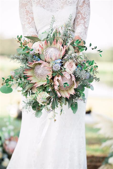 Coral and ivory wedding bouquet. Free-Spirited Bohemian Wedding Ideas at The Wildflower