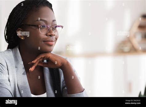Closeup Portrait Of Confident African American Businesswoman In Glasses
