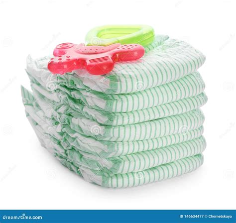 Stack Of Disposable Diapers And Teether On White Background Stock Image