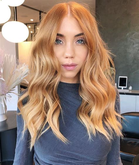 The Haircut Color And Style Worth Trying This Winter Copper Blonde Hair Strawberry Blonde