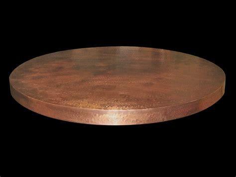 The coppersmith custom rectangular copper table top is constructed from heavy gauge solid copper sheeting and hammered over an open flame to bring out the vibrant colors, then wrapped over a solid plywood substrate and feature an optional clear coat. Custom Copper Products - Circle City Copperworks