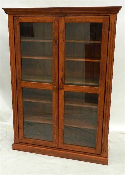 Shop our selection of solid wood library bookcases online today! A two door pine bookcase with adjustable shelves, 184 x ...