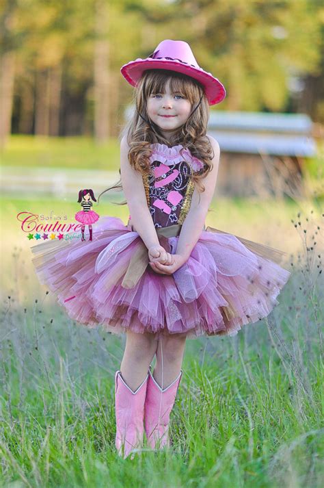 This Fabulous Diva Cowgirl Tutu Dress Is Done In Tones Of Pink Brown