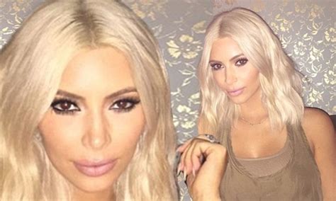 Kim Kardashian Flaunts Platinum Locks After Stepping Out In Darker Do