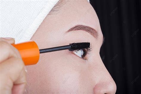 Woman Applying Mascara On Her Eyelashes Glamour Makeup Eyelash Photo