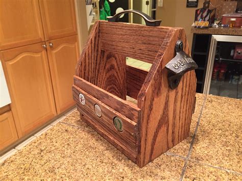 The project features instructions for building a beautiful wooden tote for six 12 oz beer bottles. DIY Beer Tote | Free Plans | Rogue Engineer