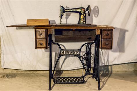 The history of singer sewing machines dates back to 1851. Antique Singer Sewing Machine with Iron Treadle and Table ...