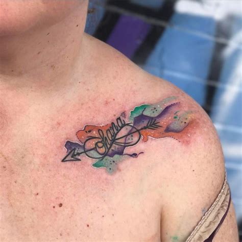 Best watercolor tattoo designs and ideas. Love the watercolor design in the background of this Ohana tattoo by Darious Malone