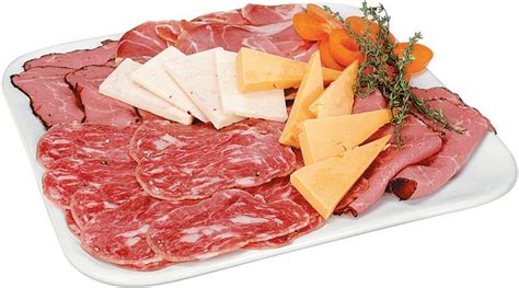 Italian Cold Cut Assortment With Garnish On White Plate Prepared Food