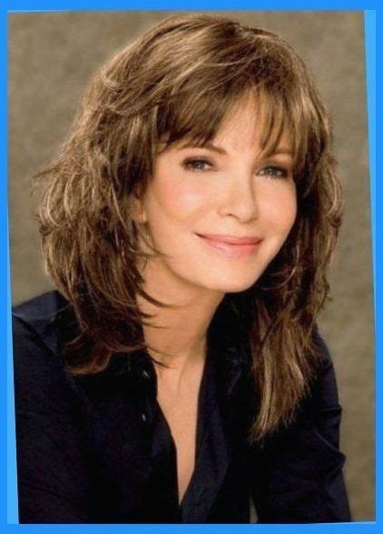 The bangs just over your forehead are kept short, and it gradually lengthens on the sides. medium length hairstyles with bangs for women over 50 ...