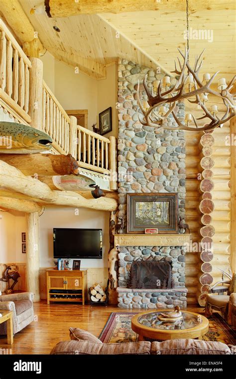 The Great Room In A Modern Log Cabin With Rustic Decor And Furniture