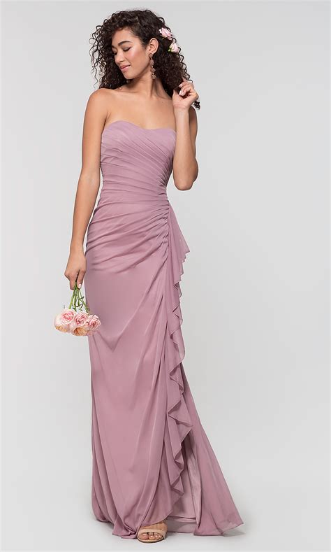 Reformation offers long bridesmaid dresses, romantic bridesmaid dresses, flowy bridesmaid dresses, maid of honor dresses, plunging bridesmaid gowns, and sustainable bridesmaid dresses, which includes pretty much all of them. Ruched Long Strapless Bridesmaid Dress by Kleinfeld